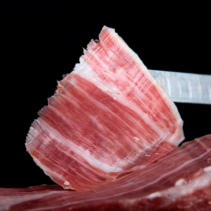 Imágenes del corte a cuchillo de un jamón ibérico