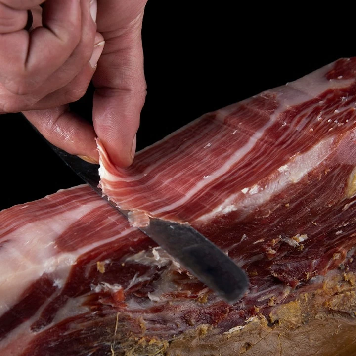 Imágenes del corte a cuchillo de un jamón ibérico